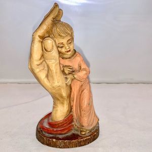 Vintage RR Roman Child Resting in Hand Figurine